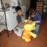 Brayan and Joel filling up the Piñata