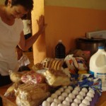 Carol with the food bought for the kids home