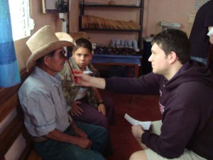 Brad giving an eye exam in Agua Caliente