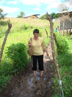 Walking through the mud to get to Raimunda's to check out the new Pulperia.